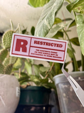 Load image into Gallery viewer, Restricted Kindle Sticker
