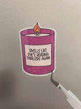 Load image into Gallery viewer, Smells like she’s reading a thriller again sticker
